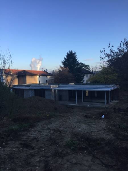 Construction d'une villa d'architecte plain pieds avec toiture terrasse plat à Caluire-et-Cuire