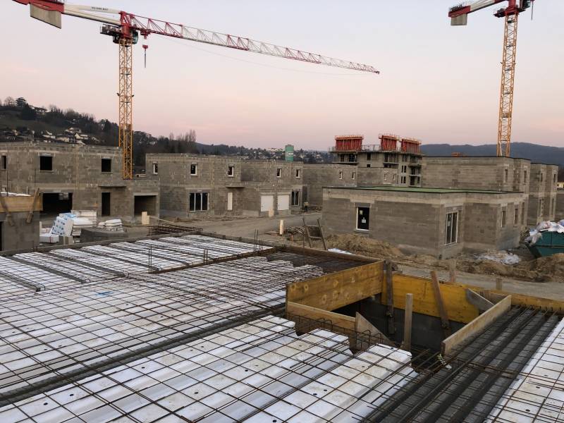 Construction d'un lotissement de 17 maisons en toiture terrasse gros œuvre près de Bourgoin Jallieu