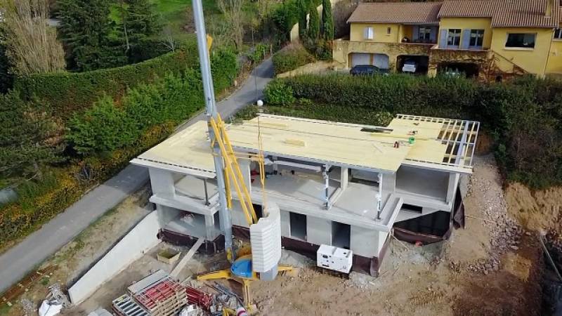 Construction d'une maison contemporaine réalisé par un architecte près de Limonest avec vue dégagé