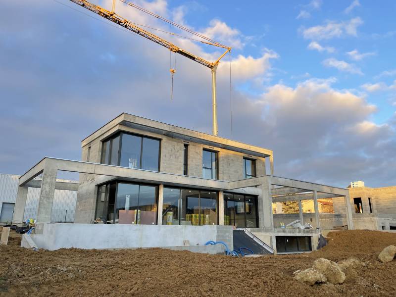 Construction d'une maison béton armé haut de gamme avec jardin à Limonest