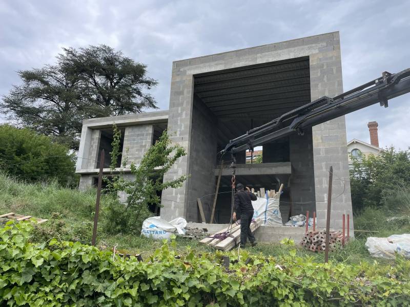 Entreprise de maçonnerie pour création d'une villa contemporaine avec baie vitrée à Saint Didier au mont d'Or